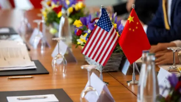 Shipping containers at a port as the United States and China discuss tariff reductions