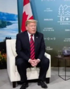 Canadian goods and U.S. and Canadian flags amid a trade dispute