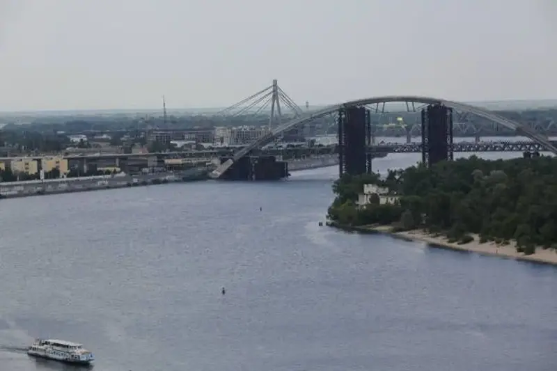 Kyiv’s Northern Bridge over the Dnipro River, where an attack damaged the roadway and trolleybus power lines